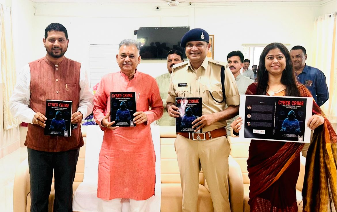 Higher Education Minister releases book titled “Cyber Crime Prevention & Fraud Management” in Indore.
